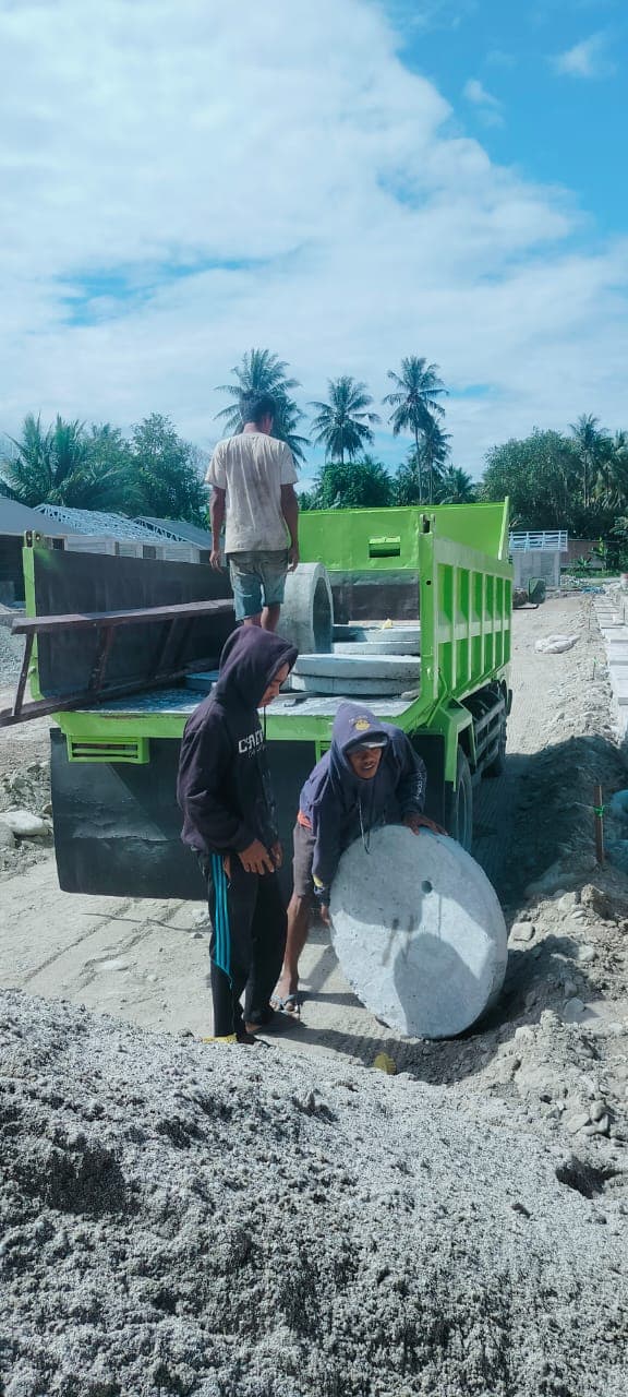 Pengantaran udhit ke lokasi